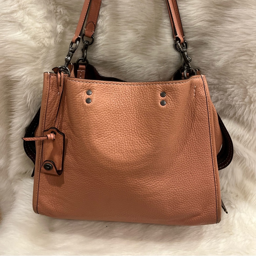 Coach rogue 30 melon color